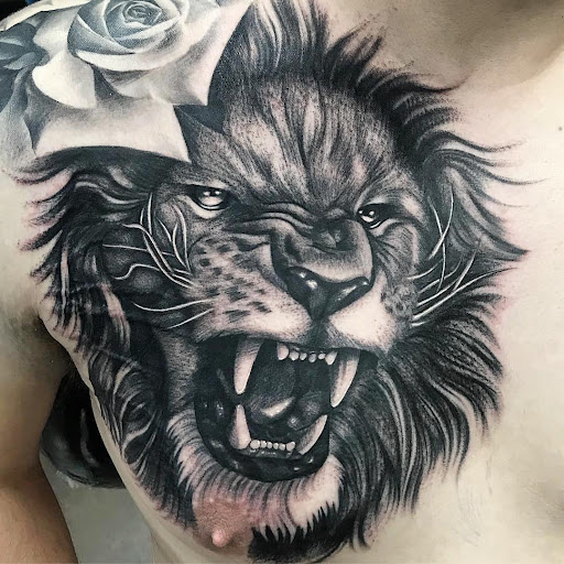 15 Best Lion and Flowers Tattoo Designs  PetPress